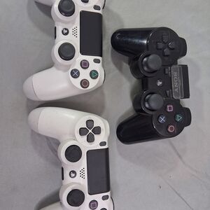 Sony DualShock Wireless Controllers - Black and White